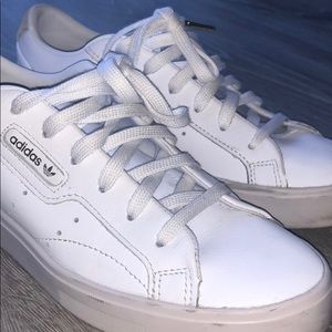 Adidas sleek leather sneakers..